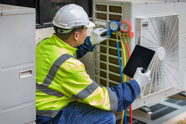 Professional Heat Pump Repair technician working in Delphi, IN